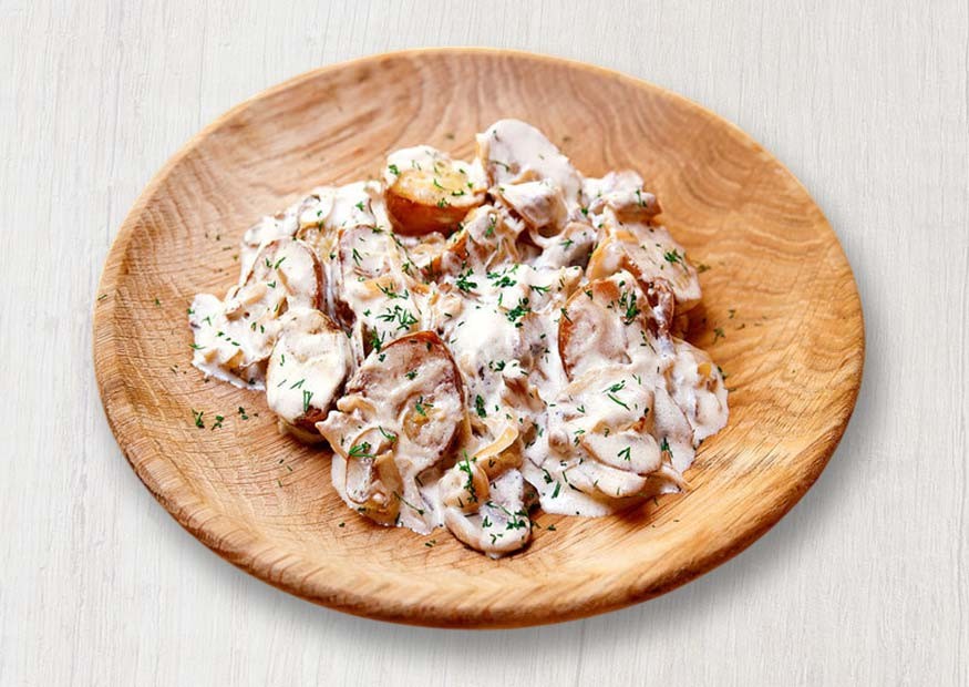 Baby potatoes with mushrooms in sour cream